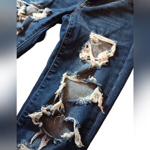 American Eagle Denim distressed jeans.